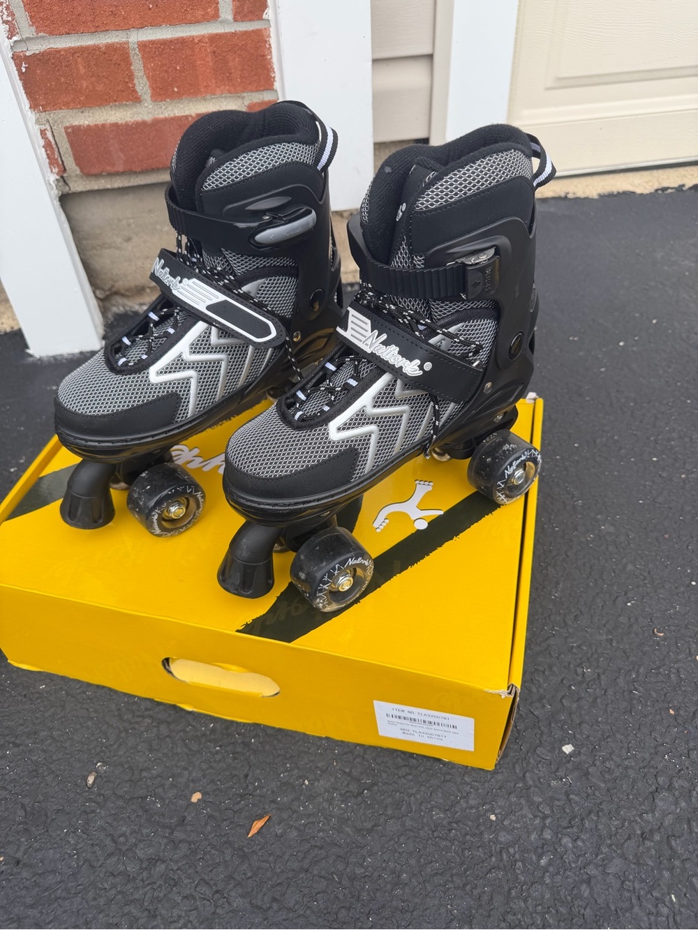 Kids Black and Gray Adjustable Quad Roller Skates by Melrose